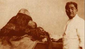 Archaeologist Julio Tello with a Paracas mummy bundle