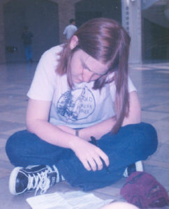 The teenage Author, sitting on the floor of a museum circa 1998, completing an AP Art History assignment.
